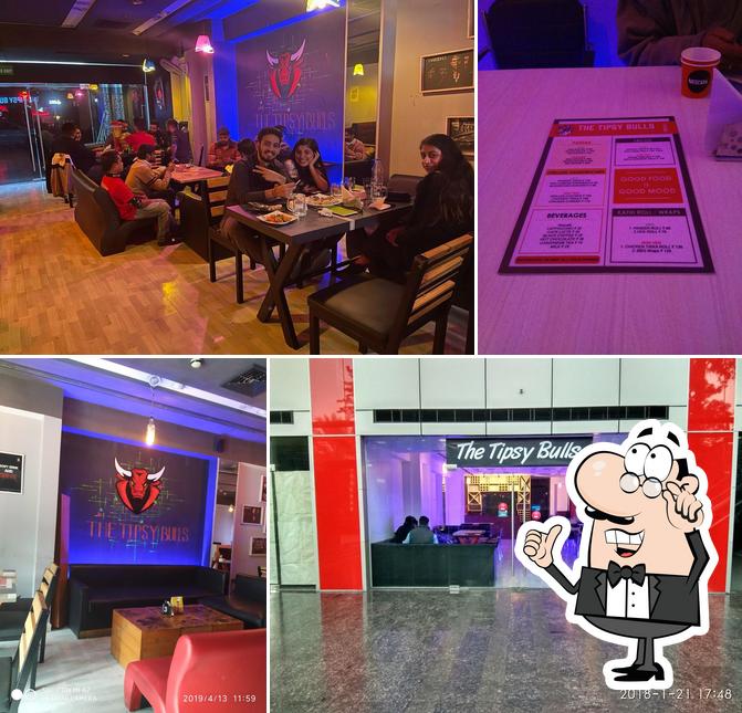 Take a seat at one of the tables at THE TIPSY BULLS