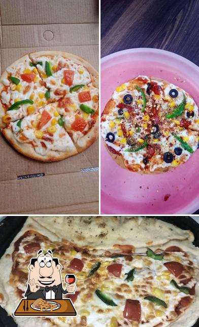 Try out pizza at Swastik The Restro Club
