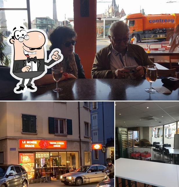 La foto di interni e bancone da bar da Le Monde Snack