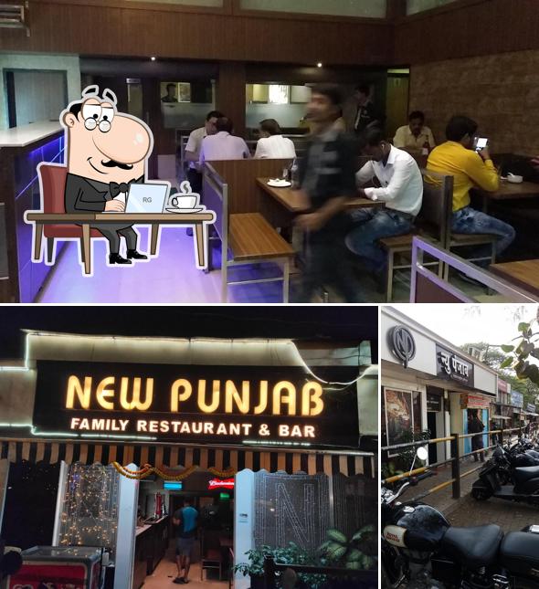 Take a seat at one of the tables at New Punjab Hotel