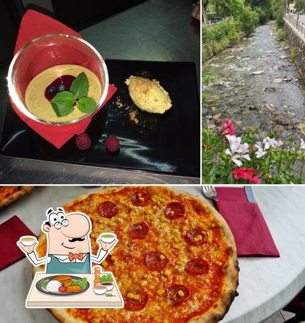 La foto di cibo e esterno da Pizzeria Restaurant Bruggenwirt