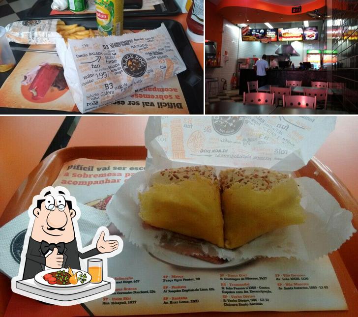 Dê uma olhada a imagem apresentando comida e interior a Black Dog Praça