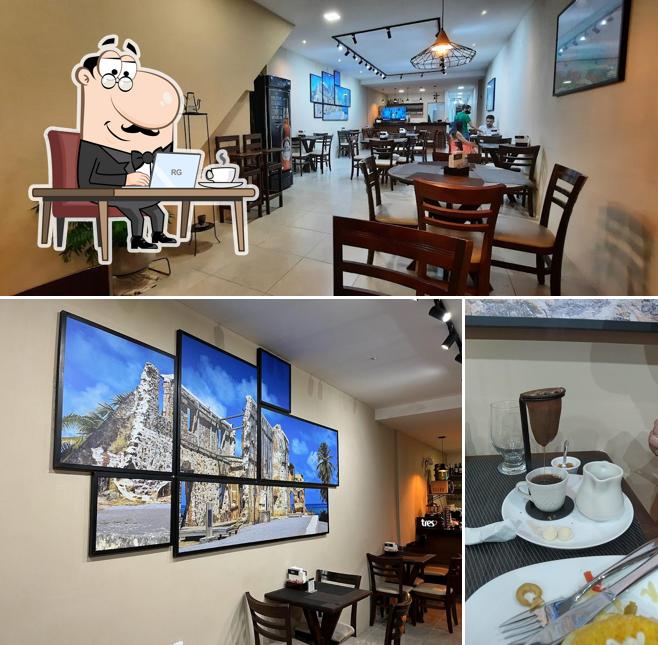 Sente em uma das mesas no Avenida Café E Bistrô