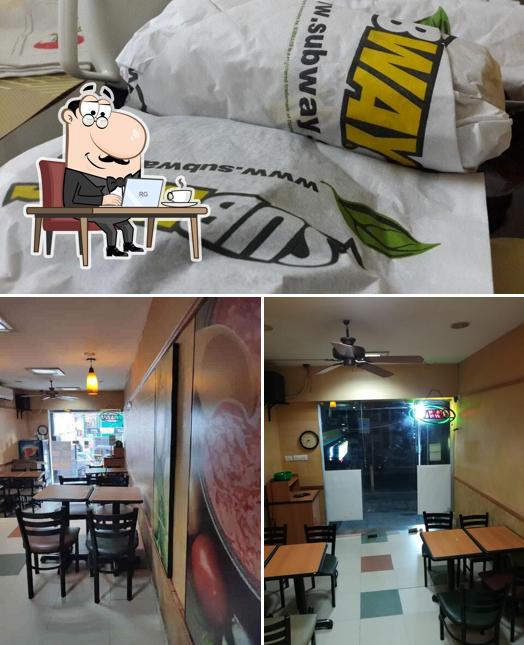 Take a seat at one of the tables at Subway Keston Road