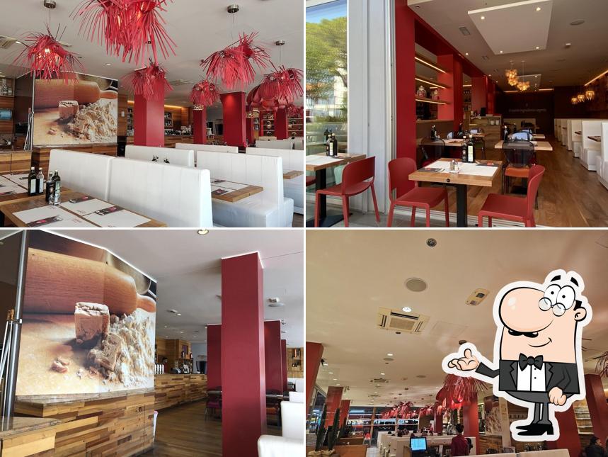 Dai un'occhiata agli interni di Amore Pizzeria Ristorante