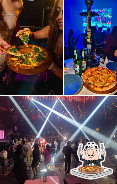 Get pizza at VAGALUMME Nightclub