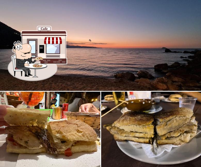 Puoi goderti l'aria fresca da seduto all'esterno di Roxy Pub