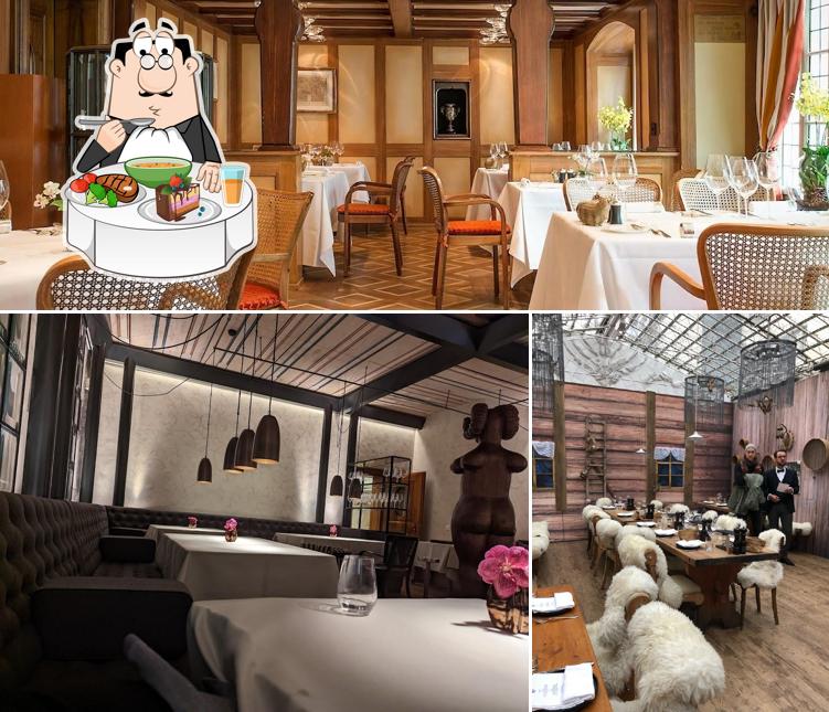 Guarda la foto che presenta la tavolo da pranzo e cibo di Widder Bar