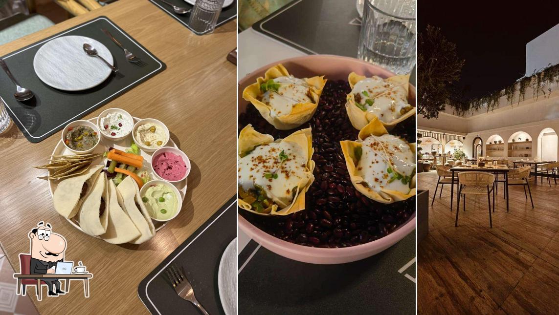 Take a seat at one of the tables at The House of Makeba - Veg Family Dining Restaurant in Science City