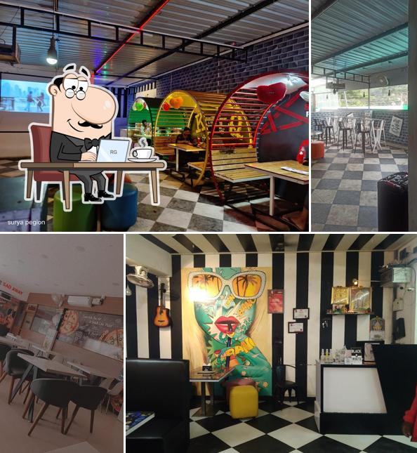 Take a seat at one of the tables at ROCK 'N' ROLL - B W RESTAURANT