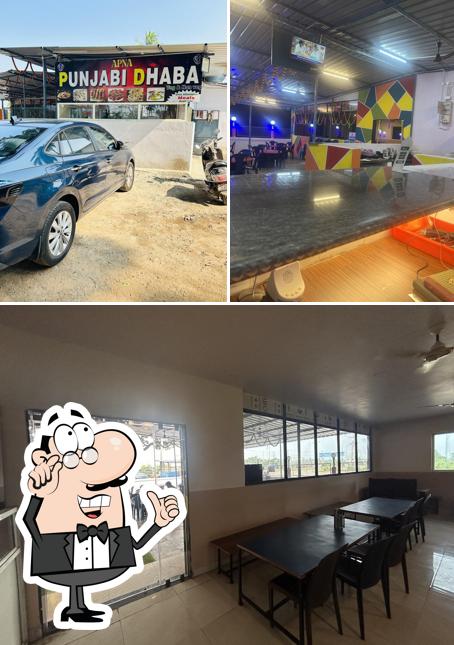 Check out the picture showing interior and exterior at APNA PUNJABI DHABA