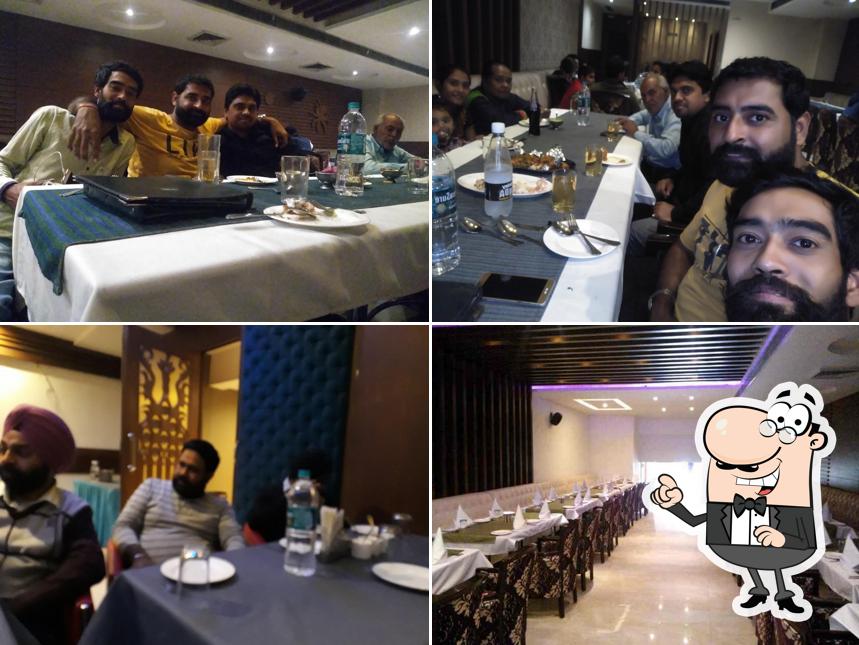 The interior of Temptation Family Restaurant In Amritsar- Amritsari sizzlers, Best food in Amritsar- fish meuniere