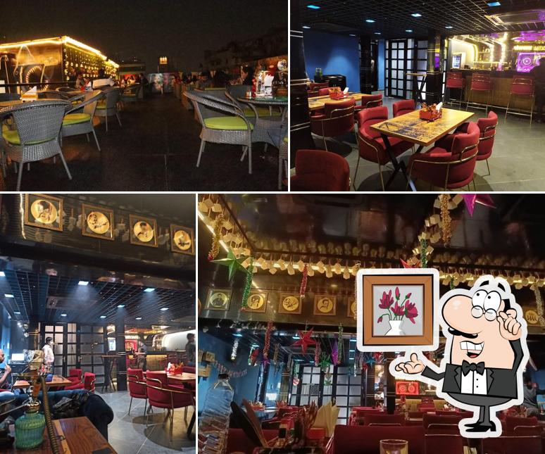 Take a seat at one of the tables at Club kolkata Mixtape