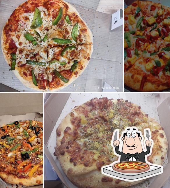 At Domino's Pizza Railway Colony, Katihar, you can taste pizza