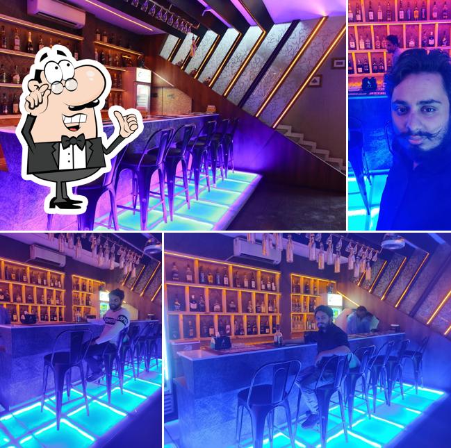 Take a seat at one of the tables at Rk Restaurant & bar