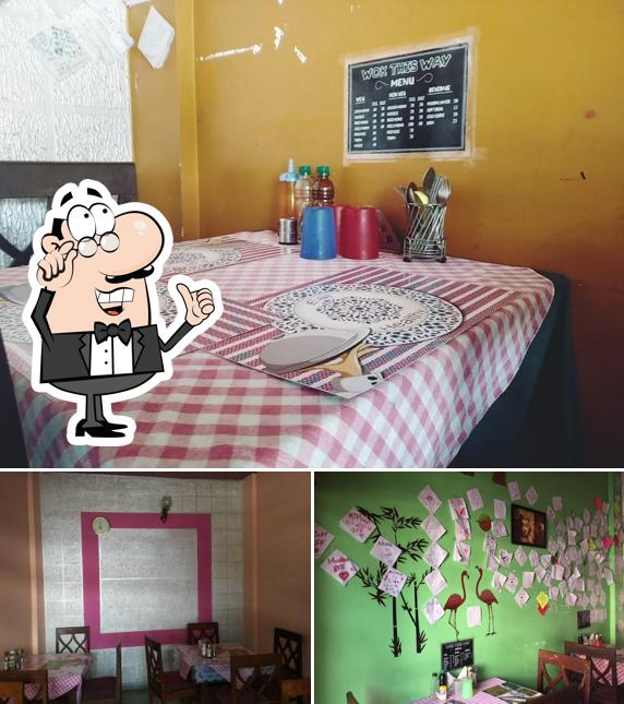 Take a seat at one of the tables at Wok This Way Restaurant