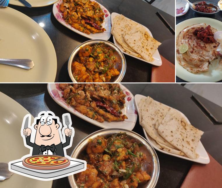 Order pizza at Sheel Kamal Restaurant