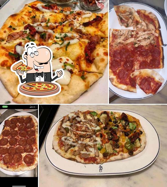 Order pizza at Andrea's Bar & Brasserie