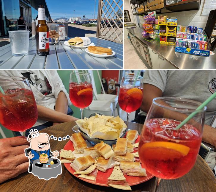 Tra le varie cose da Il posto di Alto gusto si possono trovare la cibo e interni