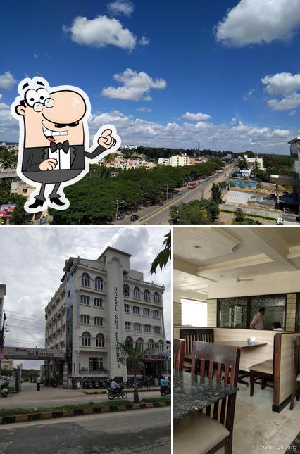 Among various things one can find exterior and dining table at Hotel Sri Krishna