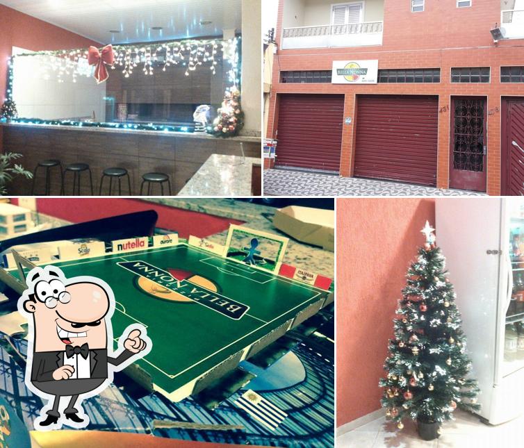 Sente em uma das mesas no Pizzaria Bella Nonna