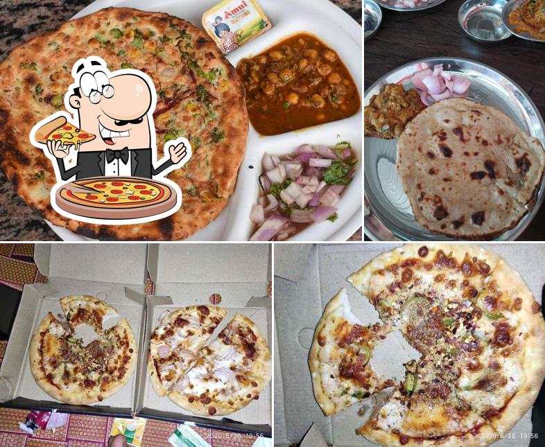 Pick pizza at Quality Restaurant & Sweets