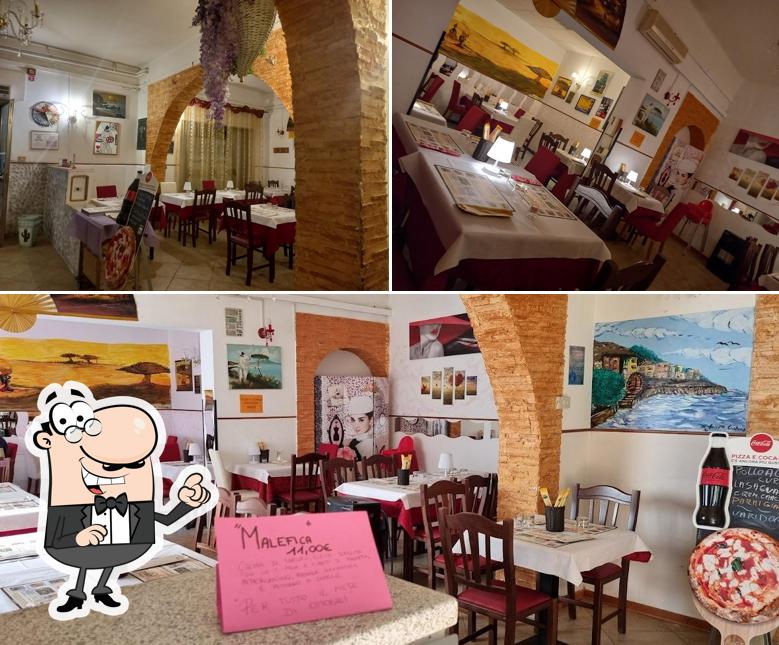 Siediti a un tavolo di Pizzeria alla Mamola