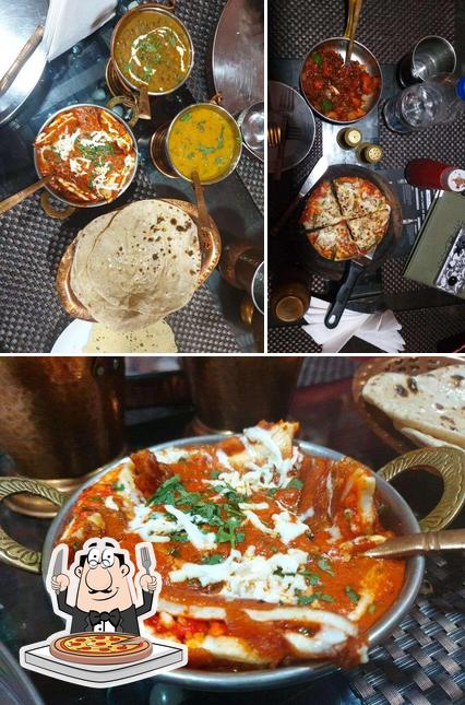 Try out pizza at The Lock Up Cafe & Restaurant