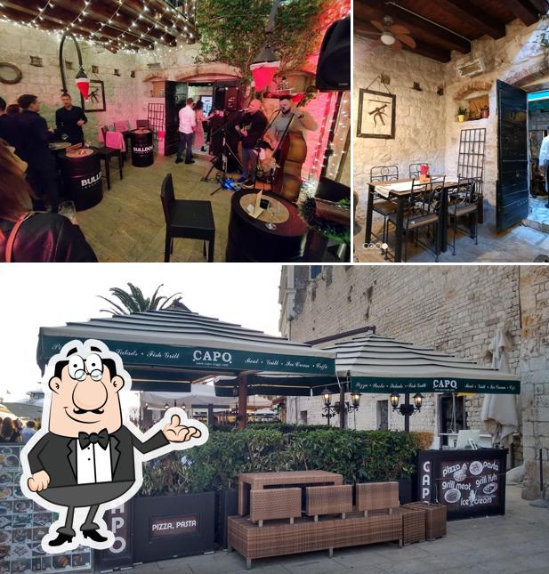 Siediti a un tavolo di Restoran Capo