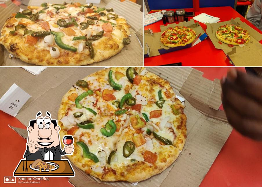 At Domino's Pizza Jawahar Nagar, Ujjain, you can try pizza