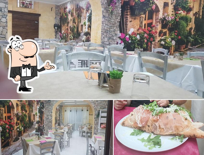 Tra le varie cose da Pizzeria e Rosticceria "L'Antica Borgata" si possono trovare la interni e cibo