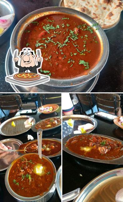 Try out pizza at Happy Punjabi Bar & Family Restaurant