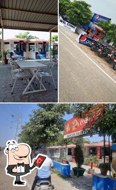 Check out the photo displaying exterior and interior at Pepcos Fast Food