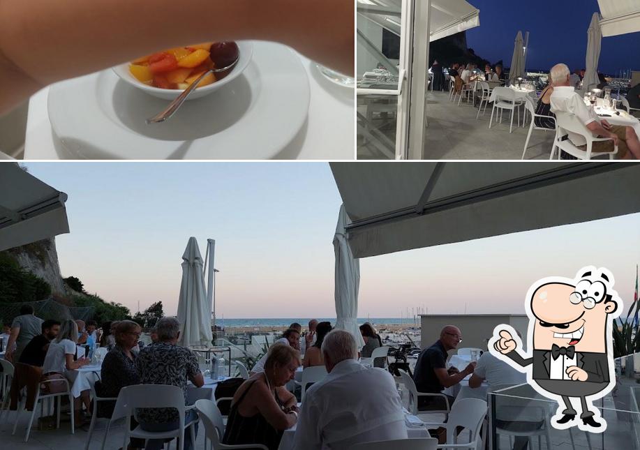 Dai un’occhiata alla foto che presenta la interni e cibo di Ristorante Massimo