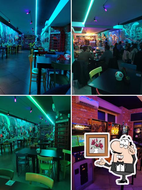 Dai un'occhiata agli interni di Level Up Pub & Game