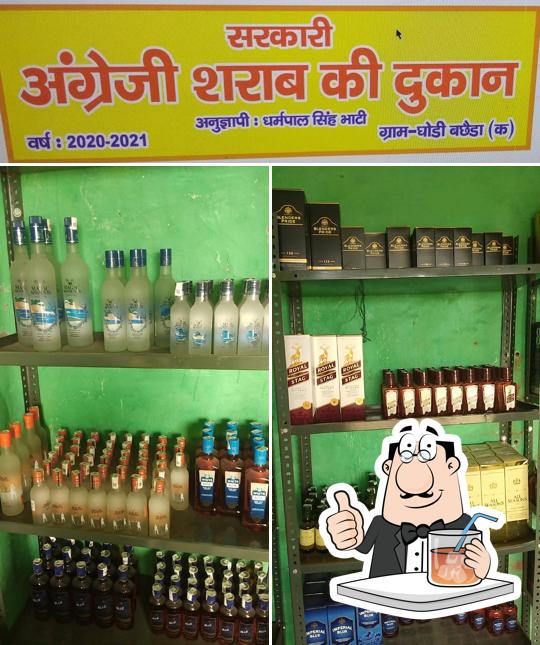 Check out the picture depicting drink and food at WINE SHOP GHORI BACHEDA