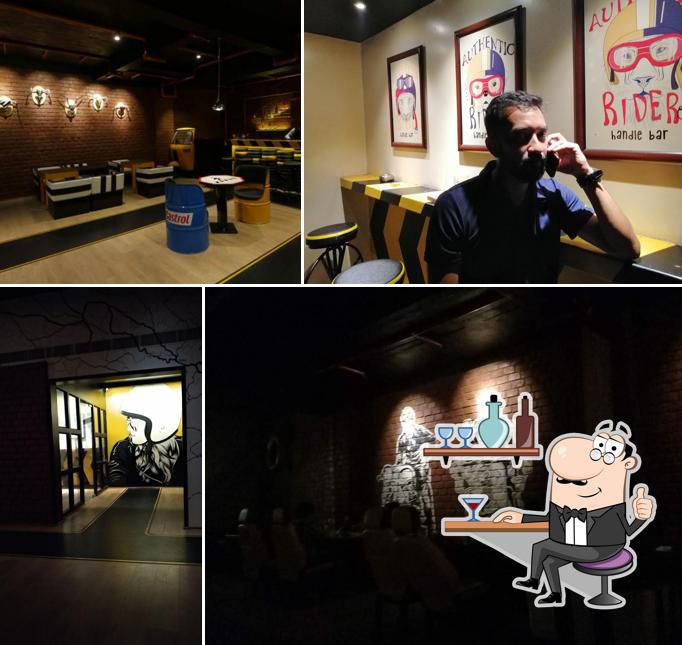 Take a seat at one of the tables at Handle Bar