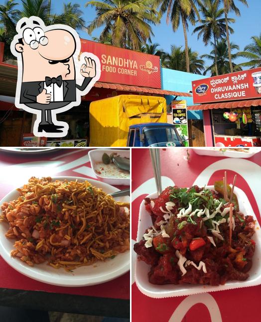 Look at the picture of Sandhya Food Corner