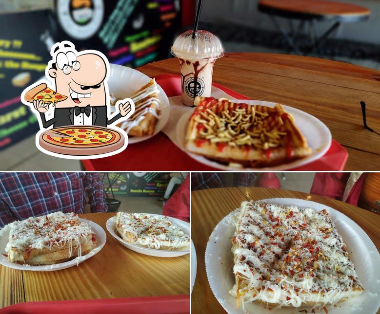 Try out pizza at Indian Coffee Shoppe(ICS)