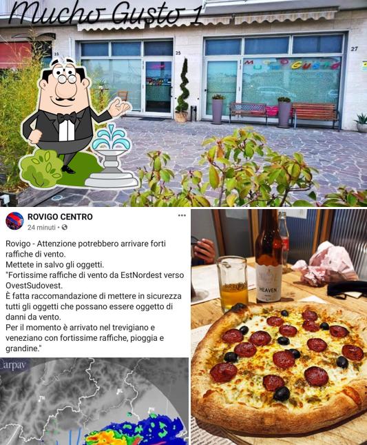 Questa è la foto che presenta la esterno e pizza di Mucho Gusto