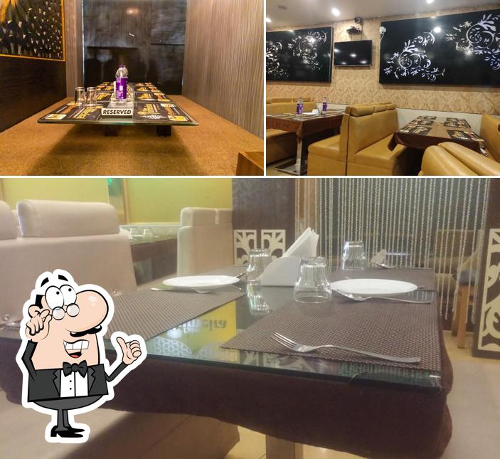 This is the photo depicting interior and blackboard at Palm Jumeira Multicusine Restaurant