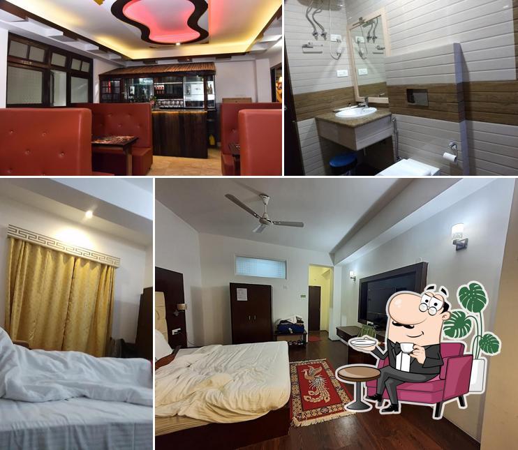 Take a seat at one of the tables at Alpine Hills Retreat by Rare Himalayas