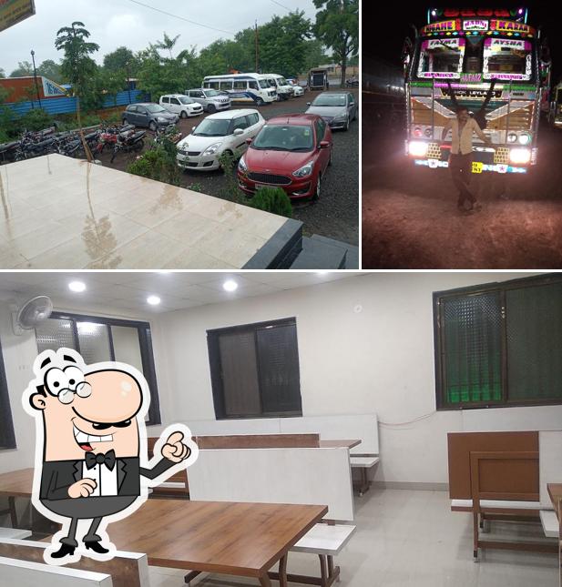 Take a seat at one of the tables at Hotel New Rajasthan