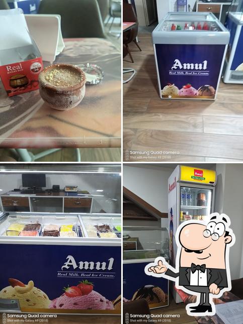 Amul Icecream parlour is distinguished by interior and food