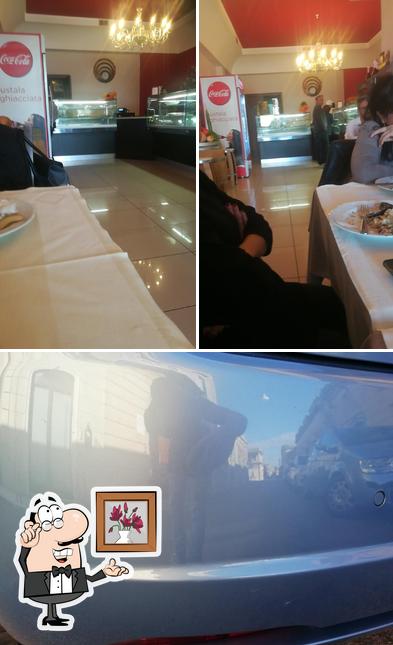 Guarda la foto che presenta la interni e esterno di Cotto E Mangiato