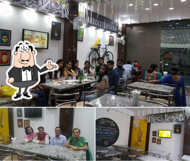 Take a seat at one of the tables at Taste of Mumbaai