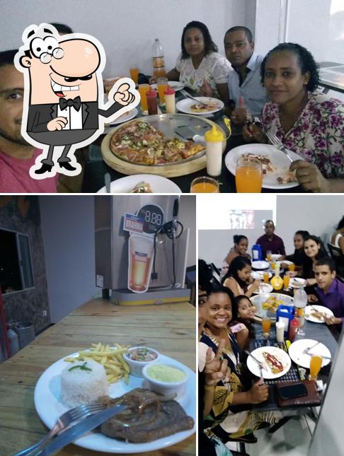 O interior do Tatal lanches e pizza