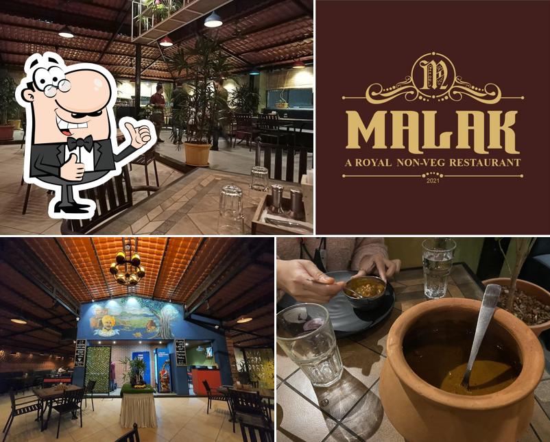 Look at the image of Malak Restaurant (Indian Cuisine)
