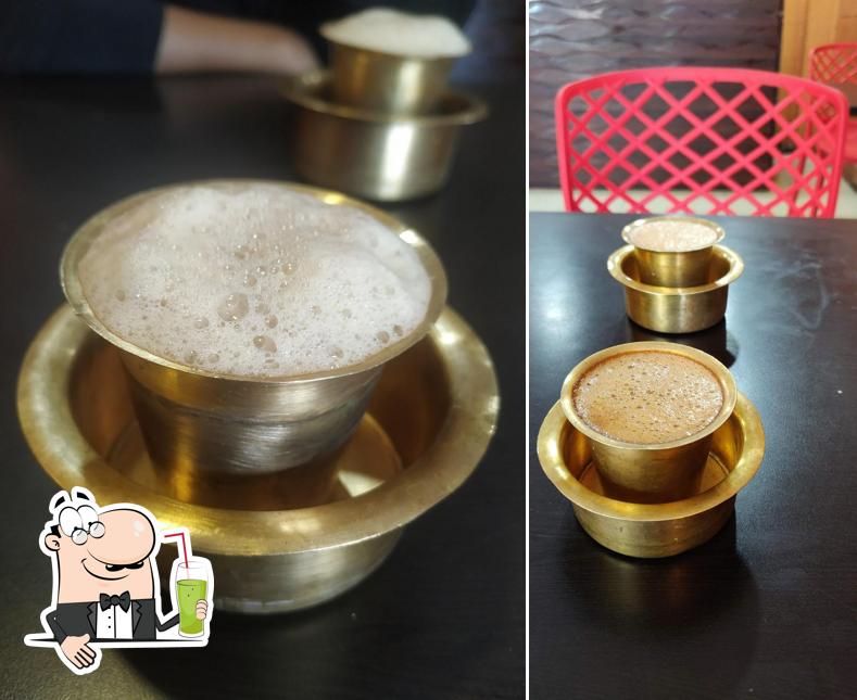 Enjoy a drink at Cafe Darshani Happy Nest