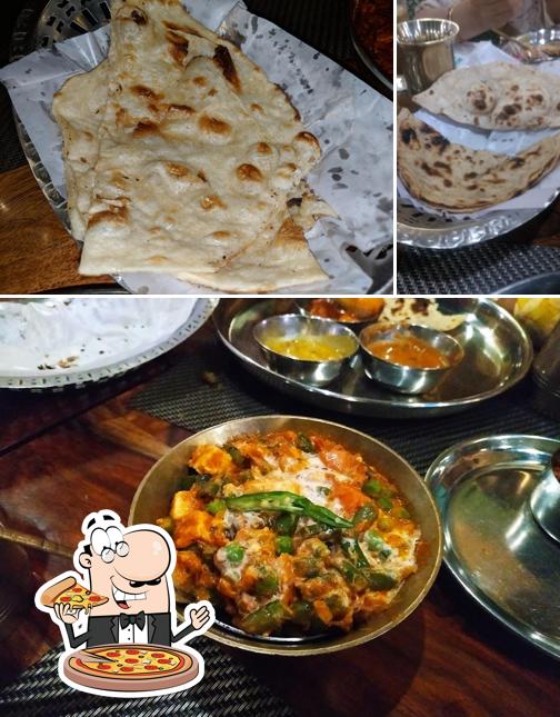 Get pizza at Pind Balluchi